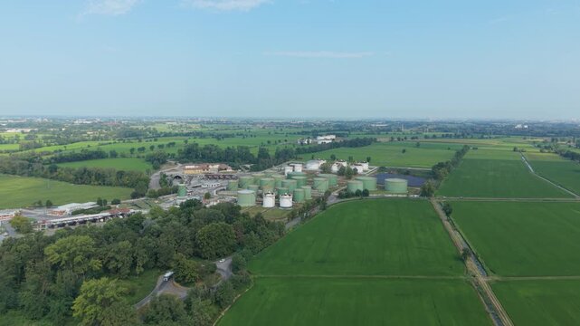 Aerial View of Oil Storage Terminal with Large Petroleum Storage Tanks in Italy
