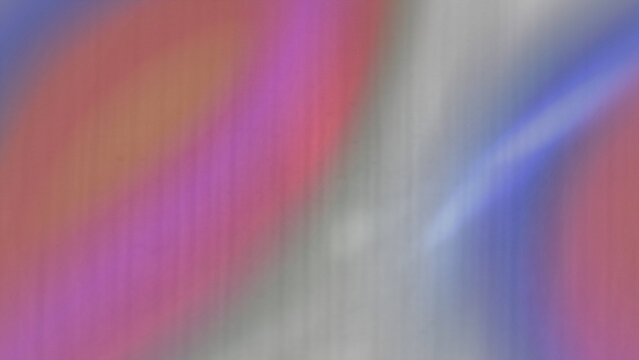 Rainbow light leak overlay texture with radiant color wave pattern glowing across electric textured texture for design