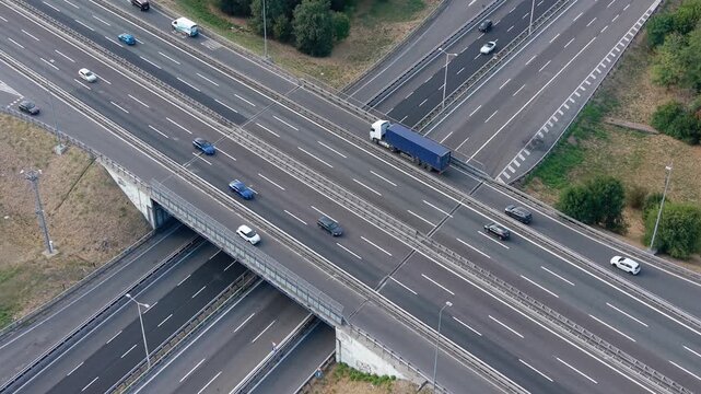 Aerial view of a Milan road interchange and connected urban infrastructure, mobility, planning, and city development concepts.