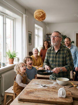Grandfather Flipping a Pancake Too High