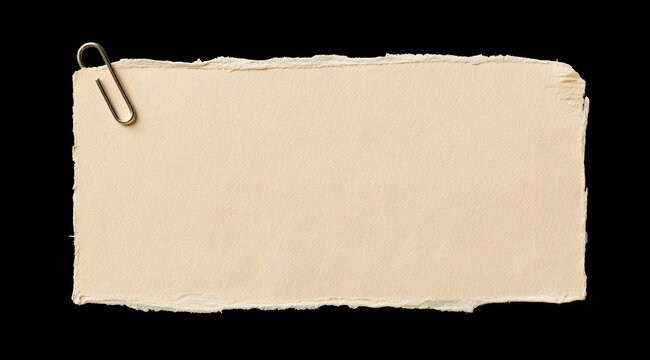 Torn beige paper note with textured edges and a metal paperclip isolated on a transparent background