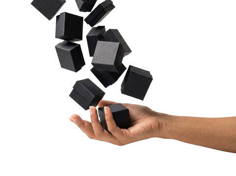 Hand catching falling black gift boxes, transparent background