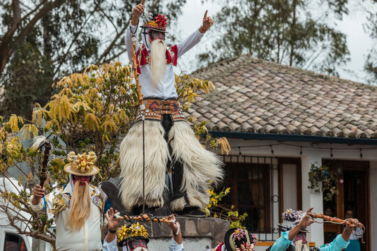 Chivo character in traditional attire performing at the cultural festival of Zuleta, Ecuador