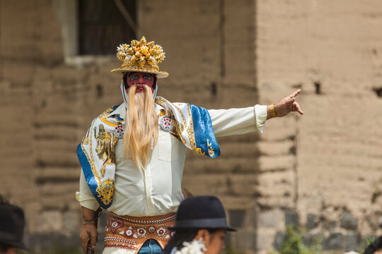 Chivo character in traditional attire performing at the cultural festival of Zuleta, Ecuador
