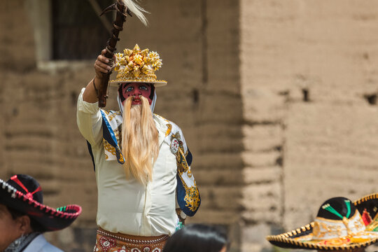 Chivo character in traditional attire performing at the cultural festival of Zuleta, Ecuador