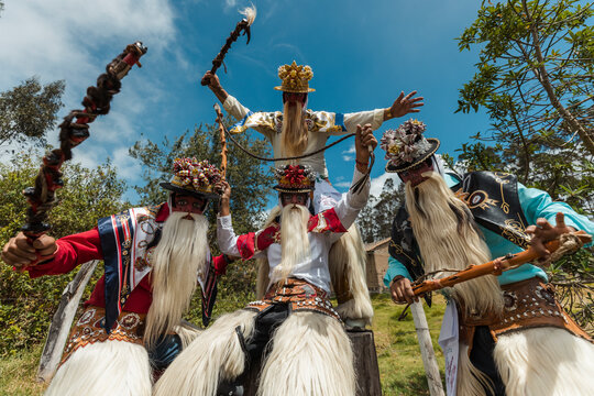 Chivo character in traditional attire performing at the cultural festival of Zuleta, Ecuador