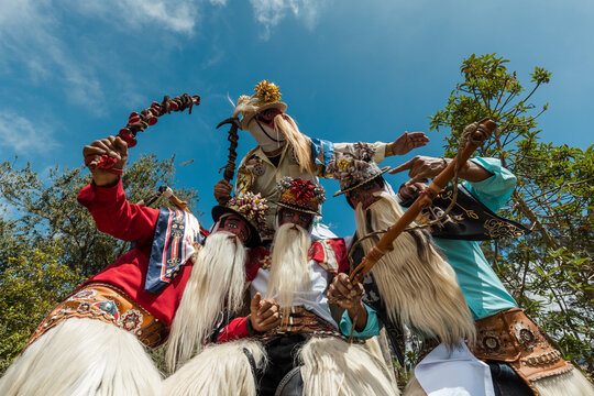 Chivo character in traditional attire performing at the cultural festival of Zuleta, Ecuador