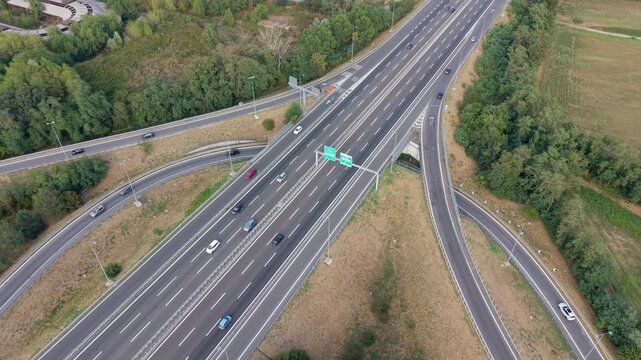 Aerial View of Busy Motorway Junction on A7 Milan&ndash;Genoa Highway, Italy
