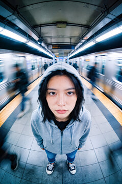 subway pov wide angle portrait waiting woman transport alone single retro streetwear classic daily