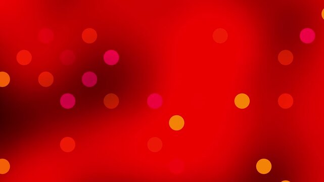 Soft red background with glowing golden and white particles. Looped animation. Abstract red gradient