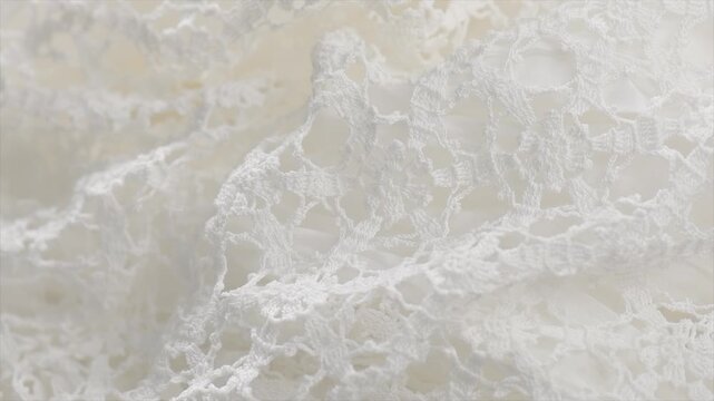 Crochet lace patterns, crocheted Grandmas Doily, Detail of hand-crocheted tablecloth background art design. Wedding tablecloth, Craft, vintage. Hobby concept. Rotating background 