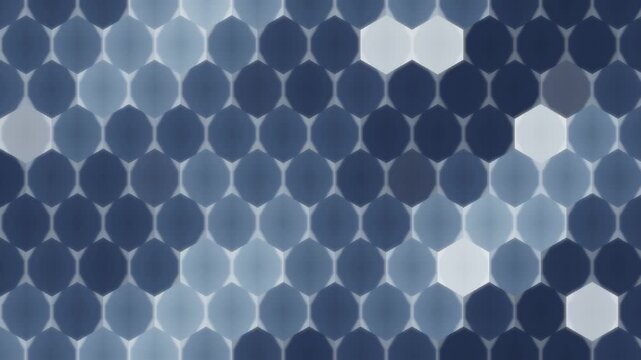 Glowing hexagonal tech grid pulsing honeycomb energy cells seamless loop in subtle silver tones