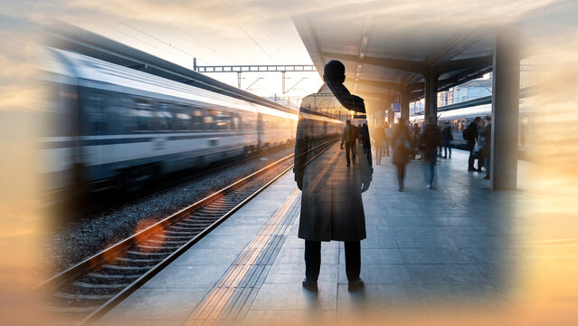Double exposure of a commuter silhouette waiting on a dawn railway platform with a blurred passing train