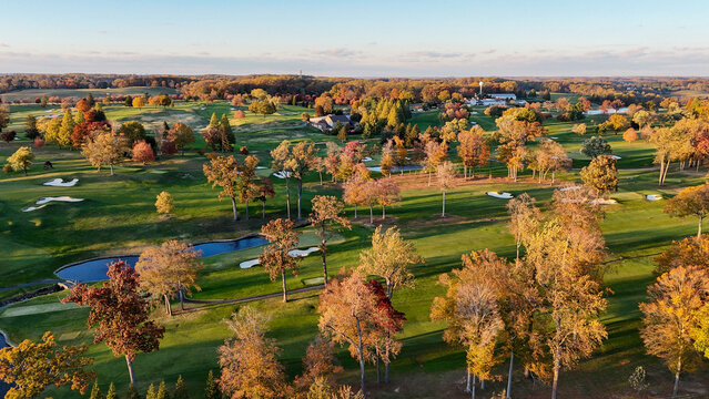 Aerial View of a Golf Course in Autumn with Colorful Fall Foliage in Greenville, Delaware