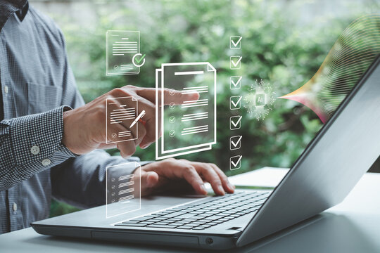 Business professional using laptop with AI powered digital documents, checklists, and workflow automation, illustrating smart technology, compliance, productivity, and efficient document management.
