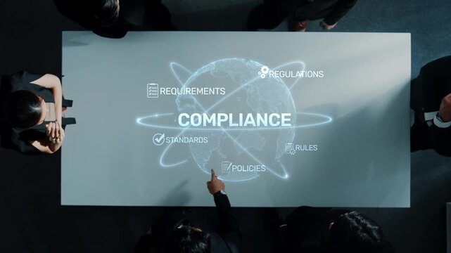 Aerial image showcasing a professional business team engaged in a strategic meeting on compliance, featuring highlighted text and global graphics on a modern table. Raster