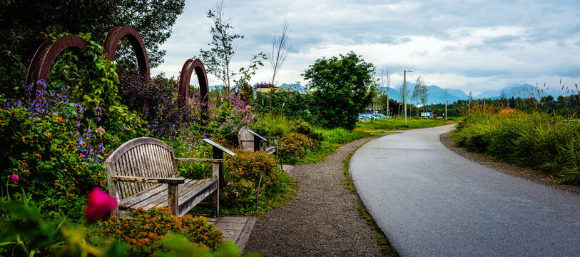 Bench along the walking trail of Anchorage coastal riverwalk in Alaska