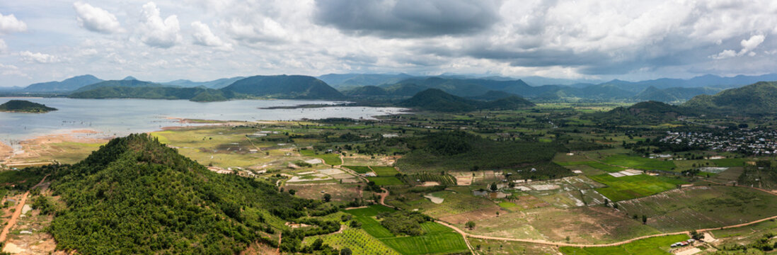 Aerial view of rice paddies and mountain range - Central Vietnam