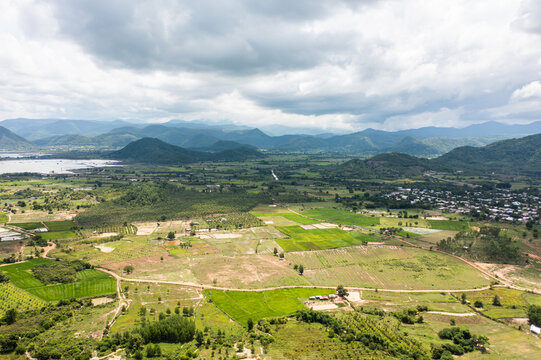 Aerial view of rice paddies and mountain range - Central Vietnam