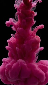 Crimson Red Pigment Swirling and Dissolving Inside Clear Water Tank