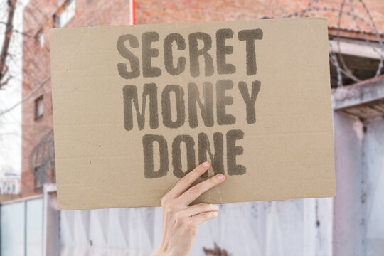 "Secret money done" Covert money transaction completion. SECRET. MONEY. DONE. COVERT. COMPLETION.