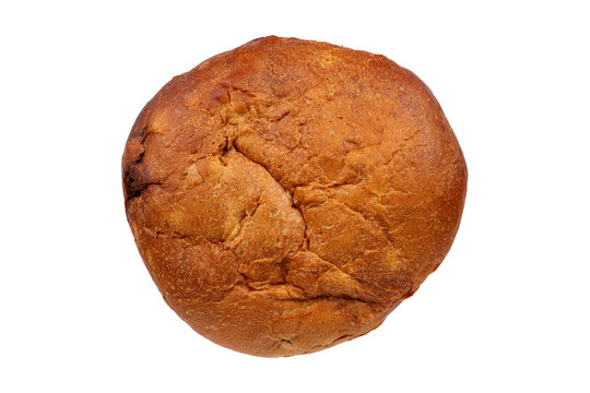 Whole Christmas panettone with a golden crust and artisanal texture, shown from a top-down view against a white background.