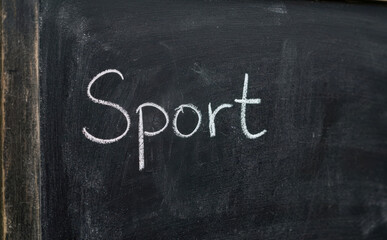 Fototapeta premium Sport auf Tafel geschrieben fur Fitness Konzept Schulleben und Bewegung