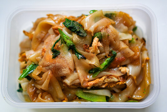Homemade Pad See Ew Thai Stir Fried Noodles with Egg in Lunch Box Top View