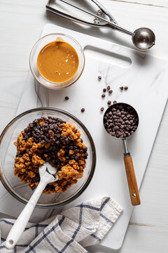 Fresh ingredients for making peanut butter and chocolate chip energy balls.