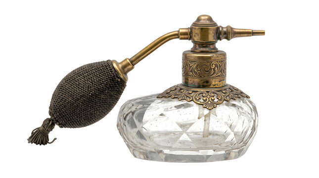 Vintage glass perfume bottle with ornate bronze atomizer pump and squeeze bulb is a classic decorative dressing table accessory for luxury cosmetic storage.