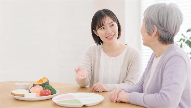 高齢女性が支援者と食生活を相談する場面