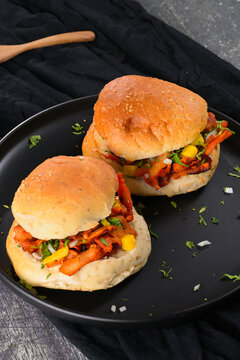 Delicious al pastor torta with fresh ingredients and vibrant colors on a food set. Mexican food