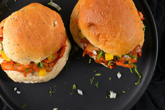 Top view of street food cemita al pastor with grilled pork and pineapple
