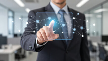 Obraz premium Professional touching a transparent futuristic interface surrounded by connected data structures, representing digital transformation and business innovation in a modern office.
