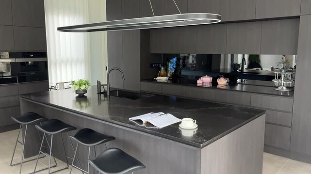 Quiet Coffee and Reading Moment in a Modern Home Kitchen