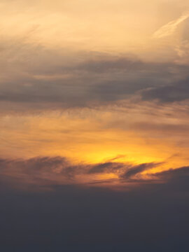 Dramatic sunset sky with vibrant orange clouds