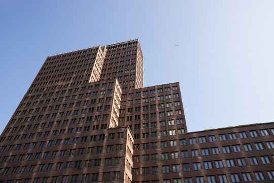 Tall brick buildings create a striking urban landscape