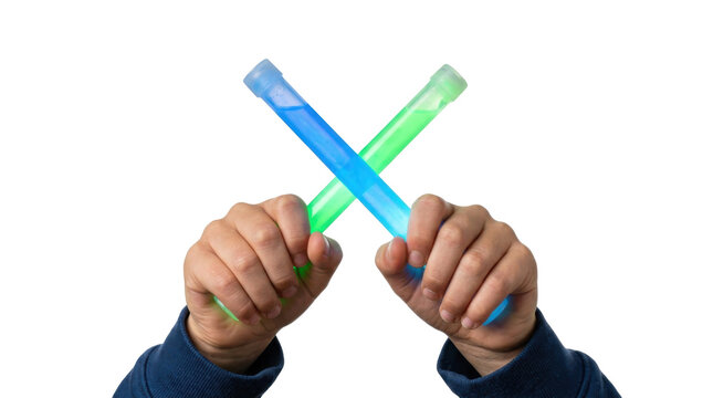 Hands holding crossed glowing light sticks blue and green for fun activity PNG Isolated on transparent background