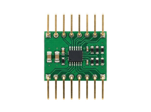 Green circuit board module with soldered components and dual-row pins for electronics assembly.
