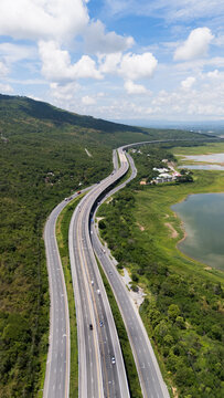 Drone shot The M6 motorway Nakhon Ratchasima Province - Bang Pa-in Lam Ta Khong River and Mountain. Motorway Korat Thailand