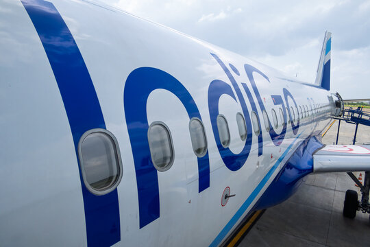 IndiGo airline airplane fuselage with windows on tarmac