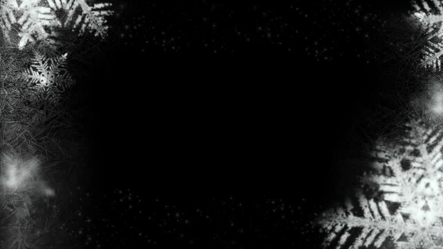 Floating white snowflakes animated border overlay against deep black background for winter season holiday designs with crystalline snowflakes drifting