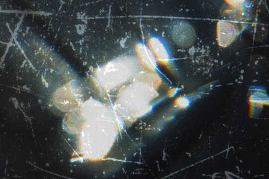 Beautiful Colorful Spectral Rainbow Lens flare light refraction through dirty scratched glass Overlay