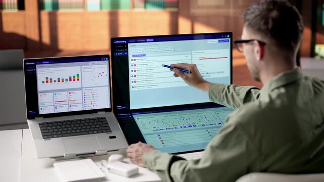 Legal Investigator Carefully Reviews Digital Evidence On Laptop