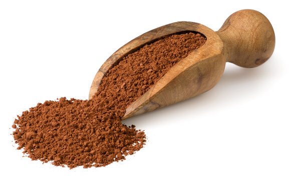 Raw cocoa powder in the wooden spoon, isolated on white background.