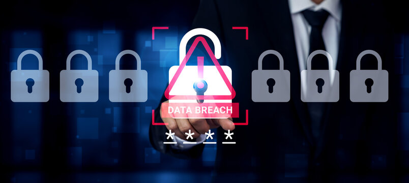 A businessman in a suit points toward a data breach alert, showcasing an open padlock symbol against a backdrop of digital locks, conveying the urgent need for cybersecurity awareness. Ledger