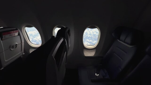 Row of Empty Airplane Seats Beside Windows during the flight. Expensive tickets and airline losses concept