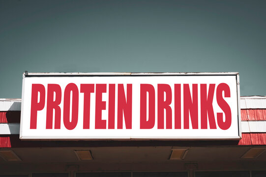Protein drinks sign on building