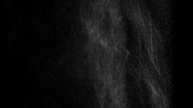 Upward drifting wind mist and fog gust rising on black background