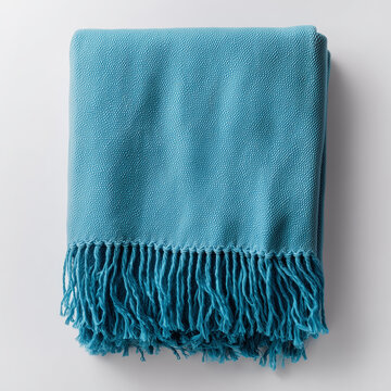 Folded light blue cashmere scarf pashmina isolated on white background